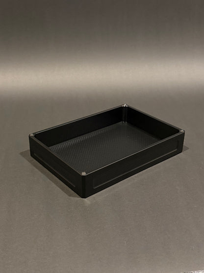 Black anodized Flex Vault Mega Lidless shown empty with large open storage compartment.