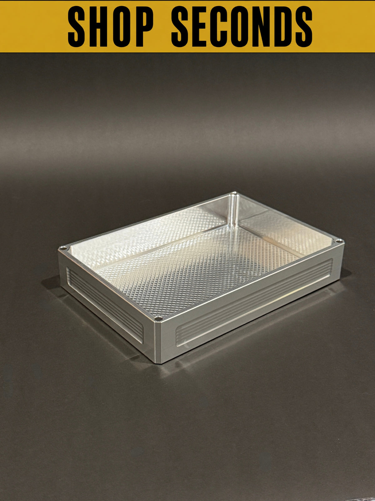 Shop Seconds Flex Vault Mega Lidless in Raw Machined shown empty with its large open storage cavity.