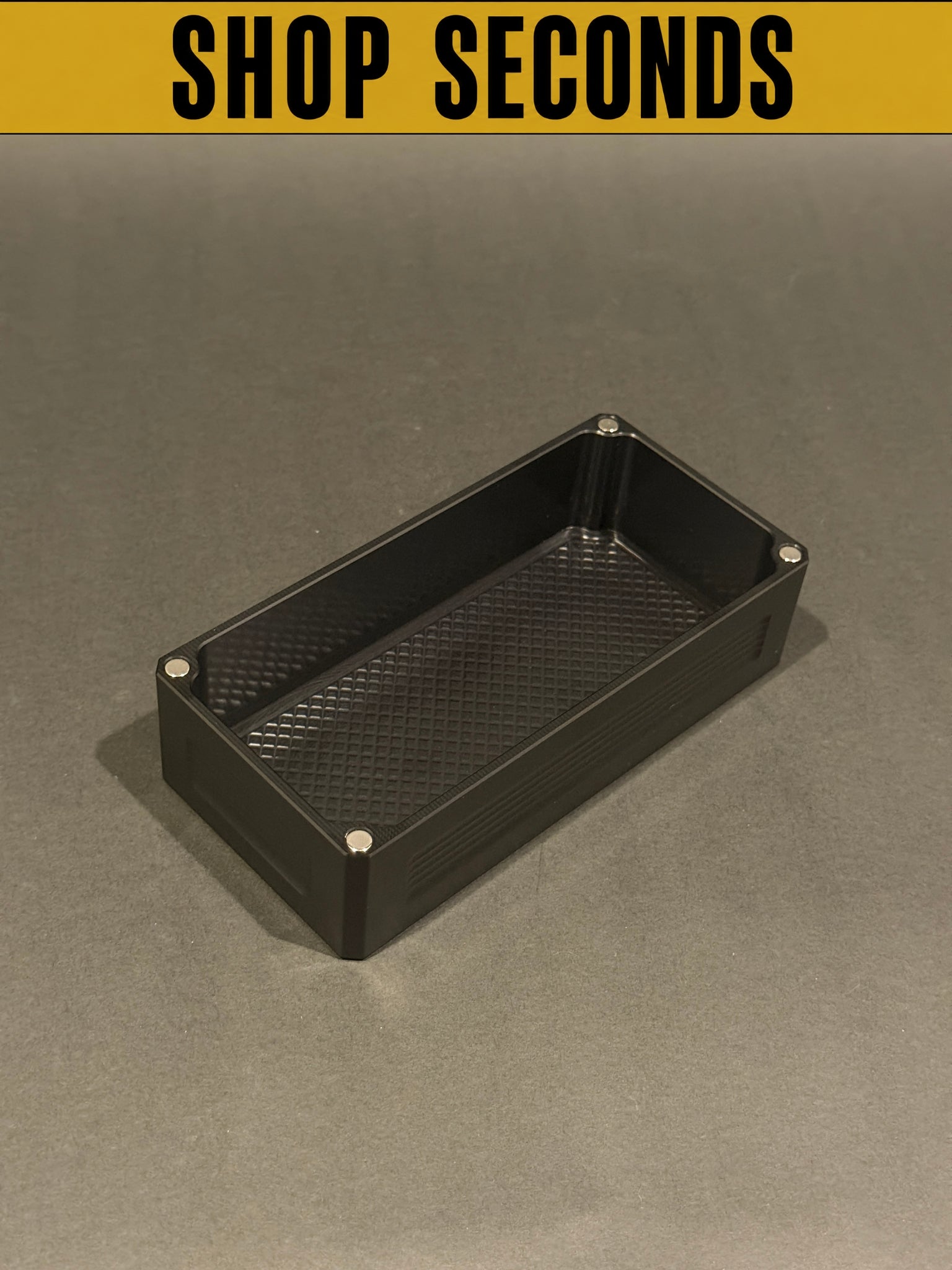 Shop Seconds black anodized Flex Vault Micro Lidless shown empty with open storage compartment.