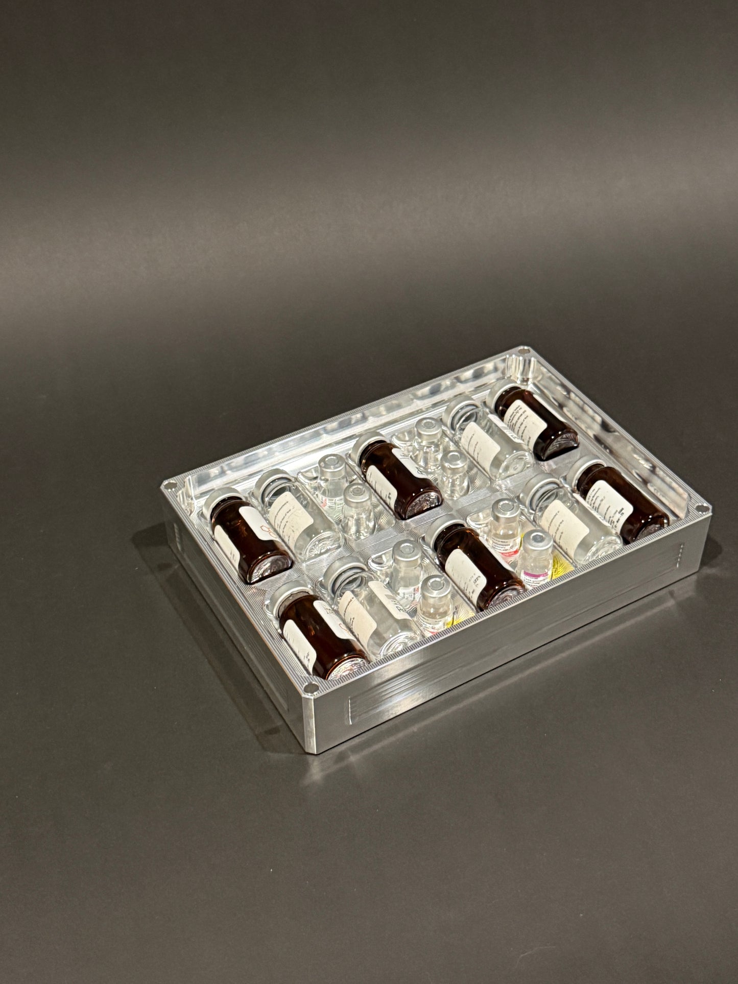 Peptide Vault Mega Lidless in Raw Machined holding vials