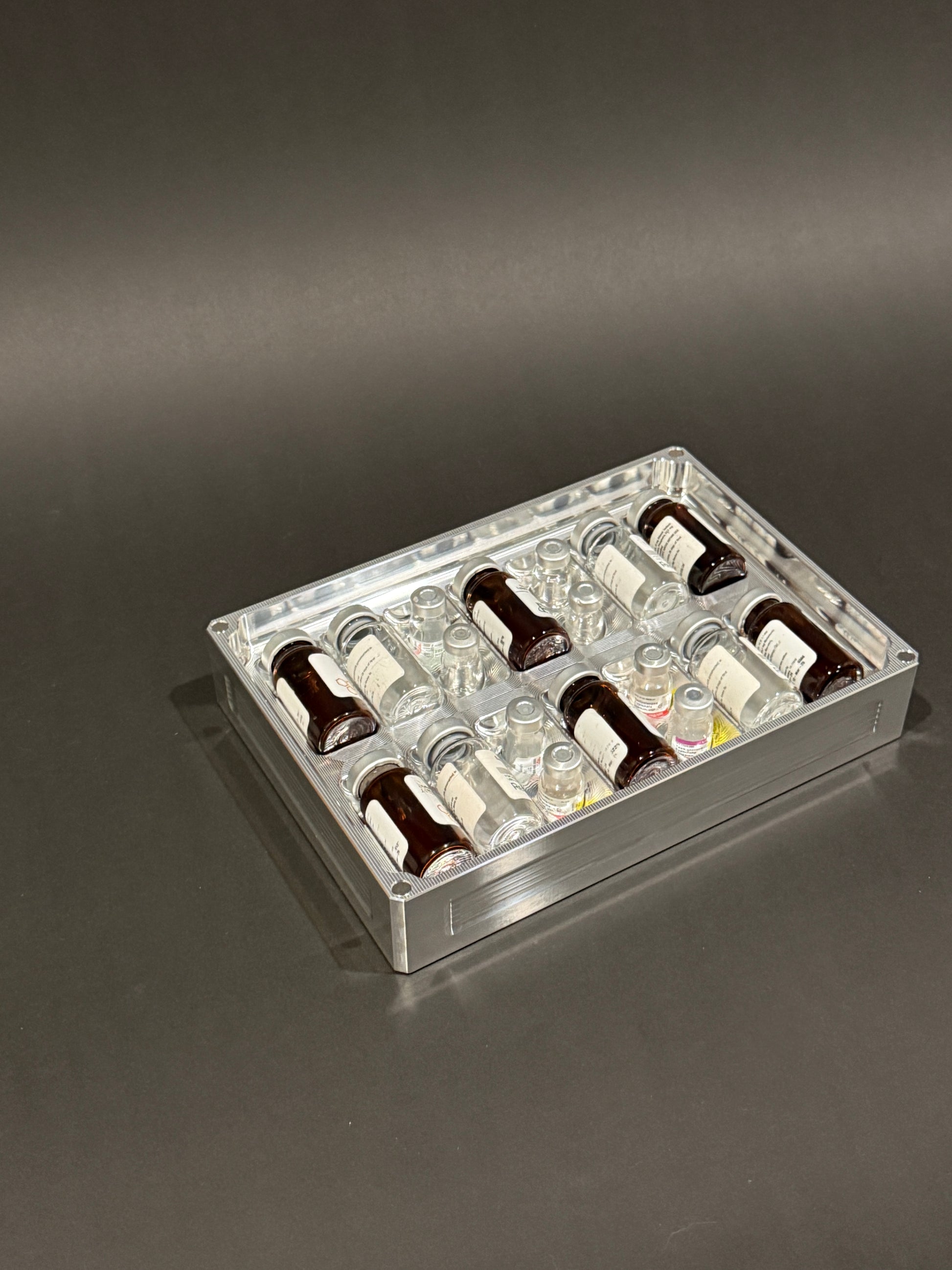 Peptide Vault Mega Lidless in Raw Machined holding vials