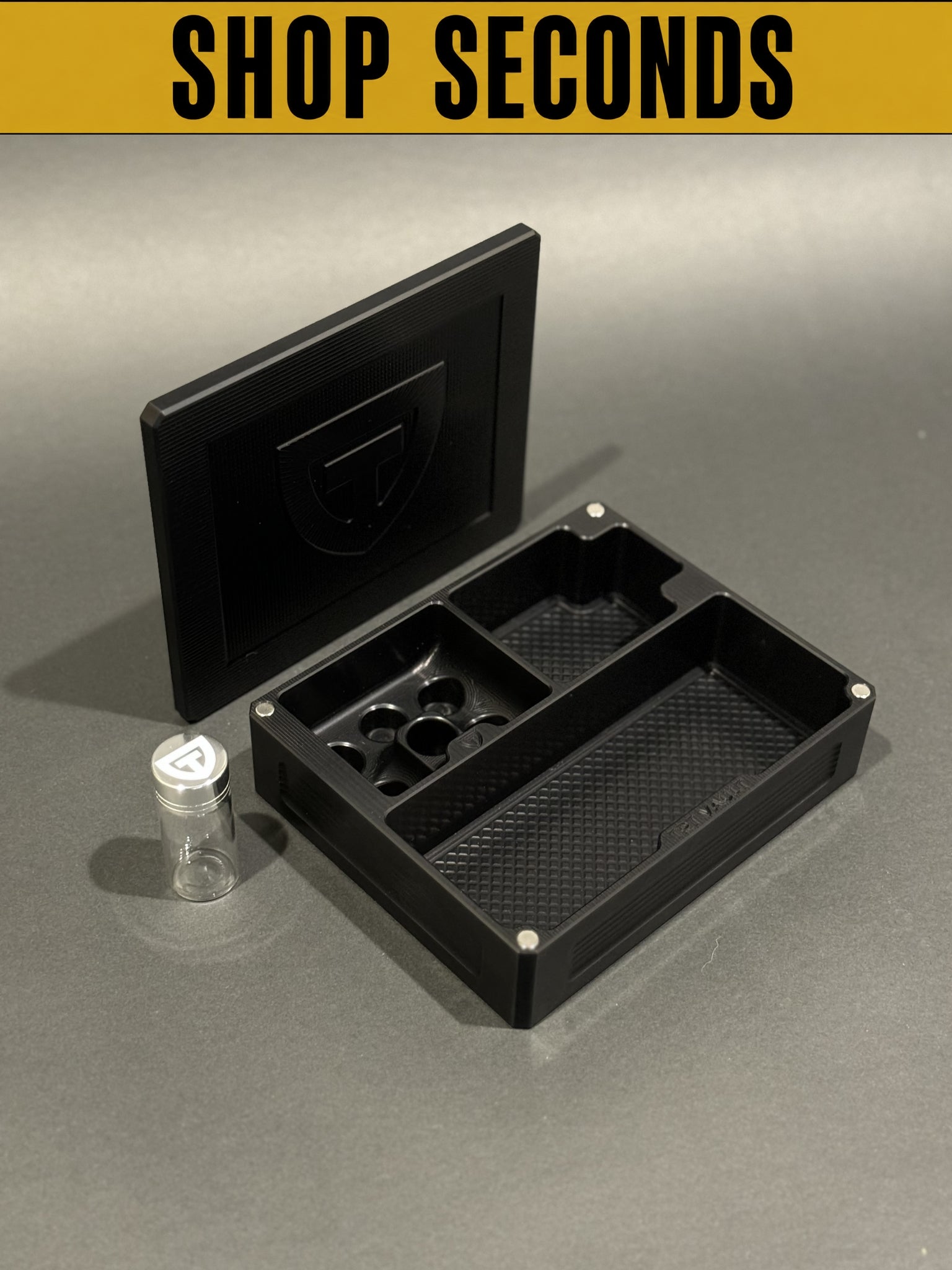 Shop Seconds TRT Vault Mini in Anodized Black shown open with removable lid and included 10 mL pill vial.