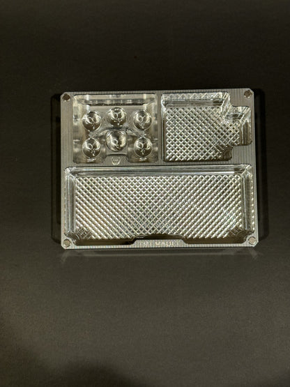 Empty TRT Vault Mini in Raw Machined shown from above with vial and syringe compartments visible.