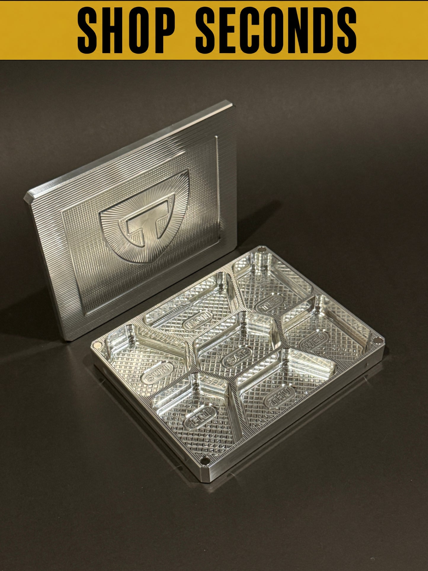 Shop Seconds raw machined Vitamin Vault Mini shown open and empty with seven compartments and magnetic lid.